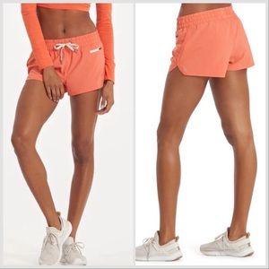Vuori Clementine Short in Grapefruit Bright Orange VW304 Sz S